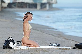 Francesca Eastwood topless on the beach in Malibu