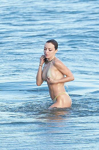 Francesca Eastwood topless on the beach in Malibu