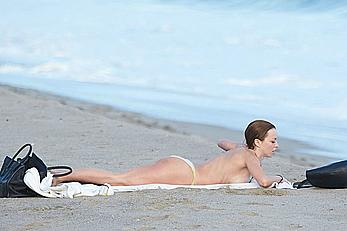 Francesca Eastwood topless on the beach in Malibu