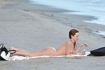 Francesca Eastwood topless on the beach in Malibu