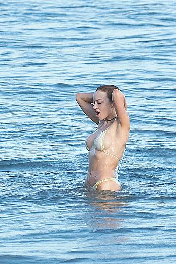 Francesca Eastwood topless on the beach in Malibu