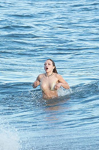 Francesca Eastwood topless on the beach in Malibu