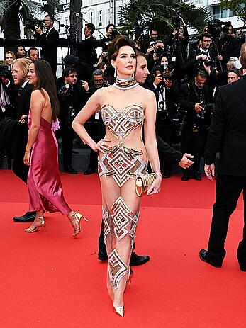 Frederique Bel in see through dress at Indiana Jones and the Dial of Destiny red carpet in Cannes