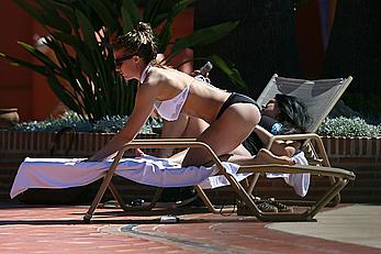 Gemma Atkinson bottom of boob in bikini poolside in Marbella