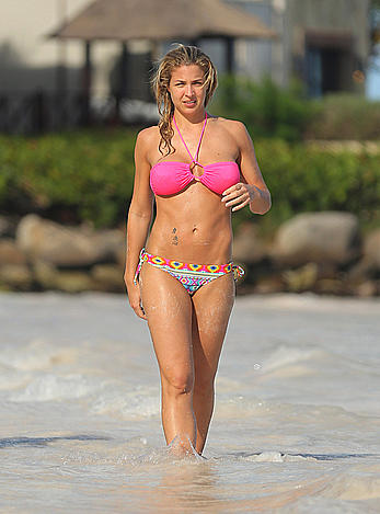 Busty Gemma Atkinson sexy in  bikini on the beach