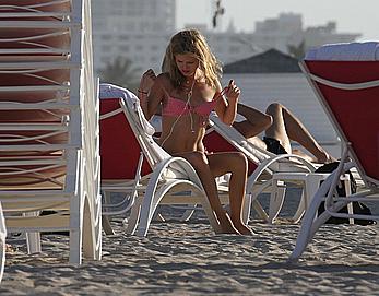 Georgia May Jagger in bikini candids on a beach