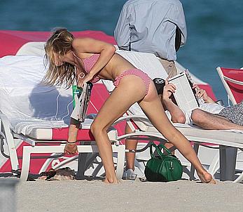 Georgia May Jagger in bikini candids on a beach