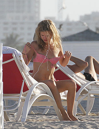 Georgia May Jagger in bikini candids on a beach