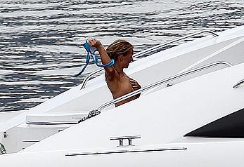 Geri Halliwell changing on a boat shows her boobs