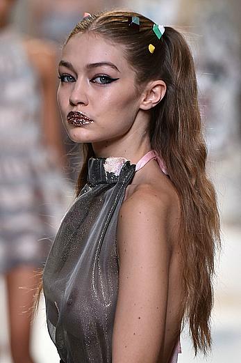 Gigi Hadid in see through dress runway pics at Fendi Show