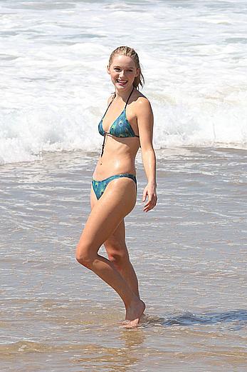 Greer Grammer wearing a bikini on a beach