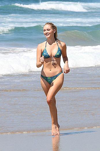 Greer Grammer wearing a bikini on a beach