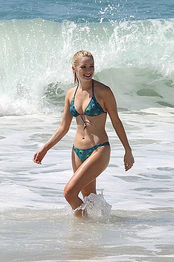 Greer Grammer wearing a bikini on a beach