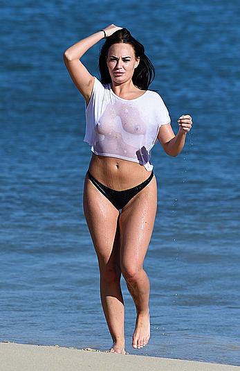 Hayley Fanshaw in wet see through top on a beach