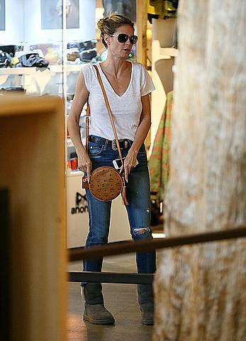 Heidi Klum braless shopping at Burton Flagship Store