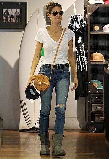 Heidi Klum braless shopping at Burton Flagship Store