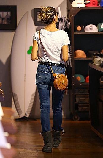 Heidi Klum braless shopping at Burton Flagship Store