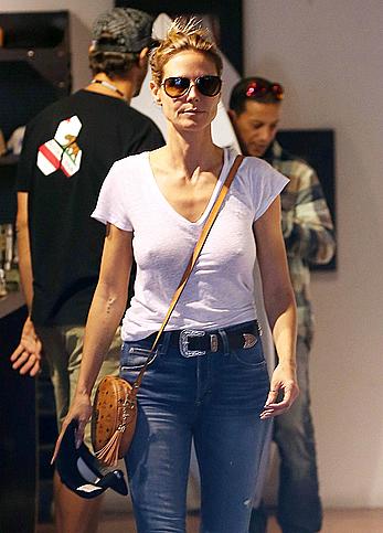 Heidi Klum braless shopping at Burton Flagship Store