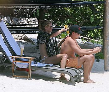 Heidi Klum caught topless on a beach in Mexico