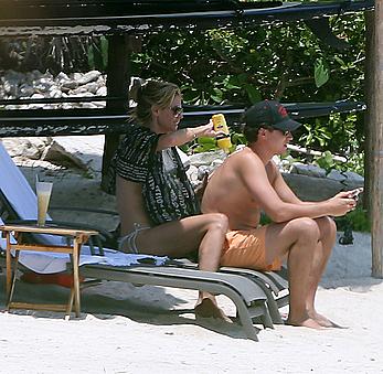 Heidi Klum caught topless on a beach in Mexico