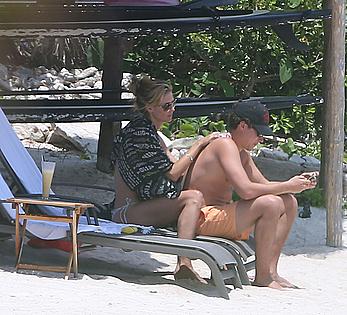 Heidi Klum caught topless on a beach in Mexico