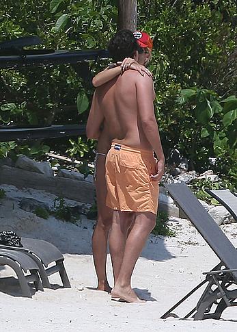 Heidi Klum caught topless on a beach in Mexico