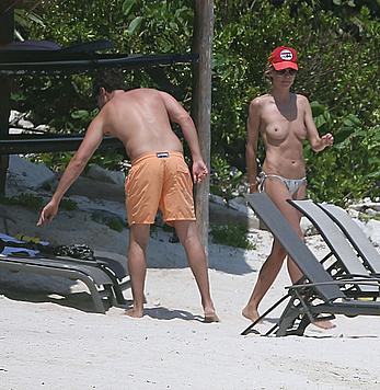 Heidi Klum caught topless on a beach in Mexico