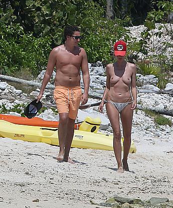 Heidi Klum caught topless on a beach in Mexico