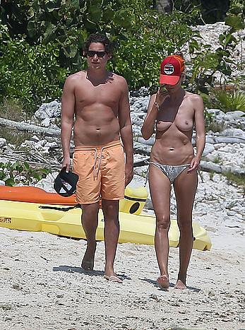 Heidi Klum caught topless on a beach in Mexico