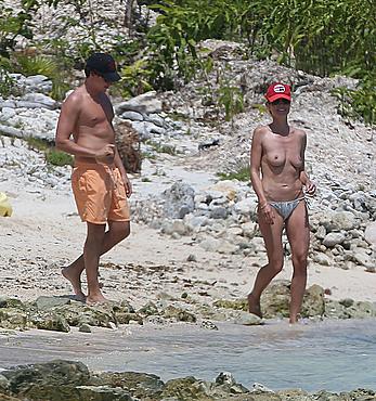 Heidi Klum caught topless on a beach in Mexico