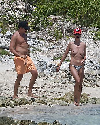 Heidi Klum caught topless on a beach in Mexico