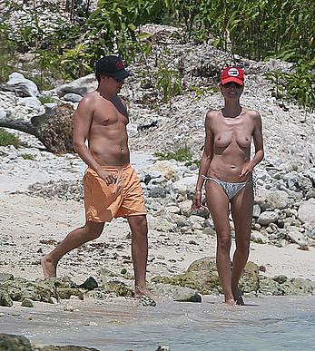 Heidi Klum caught topless on a beach in Mexico