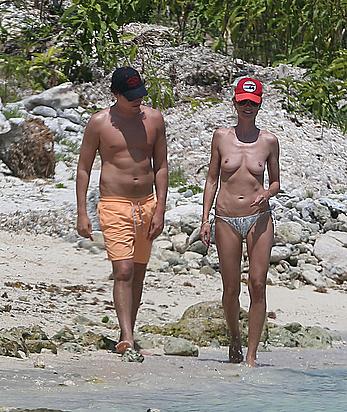 Heidi Klum caught topless on a beach in Mexico