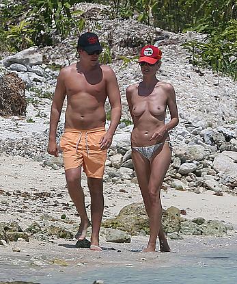 Heidi Klum caught topless on a beach in Mexico