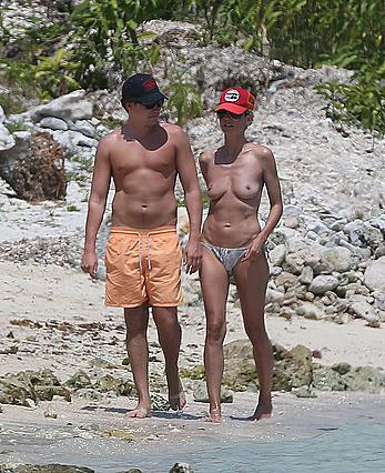 Heidi Klum caught topless on a beach in Mexico