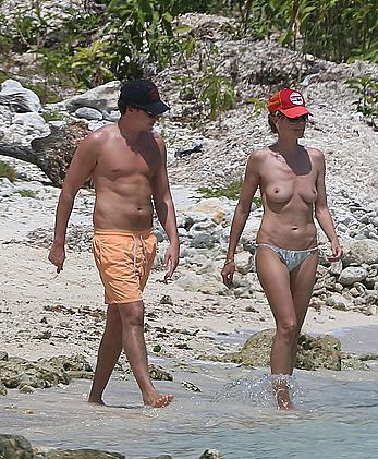 Heidi Klum caught topless on a beach in Mexico