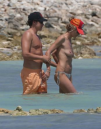 Heidi Klum caught topless on a beach in Mexico