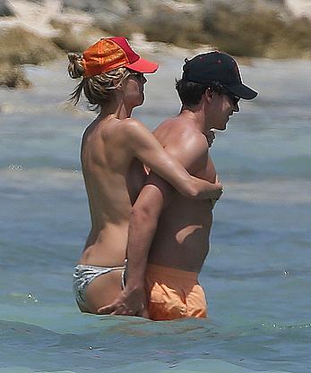 Heidi Klum caught topless on a beach in Mexico