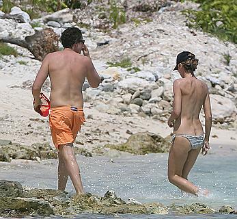 Heidi Klum caught topless on a beach in Mexico