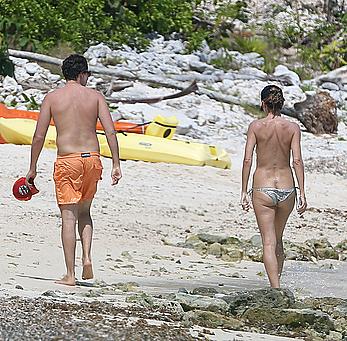 Heidi Klum caught topless on a beach in Mexico