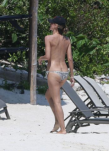 Heidi Klum caught topless on a beach in Mexico