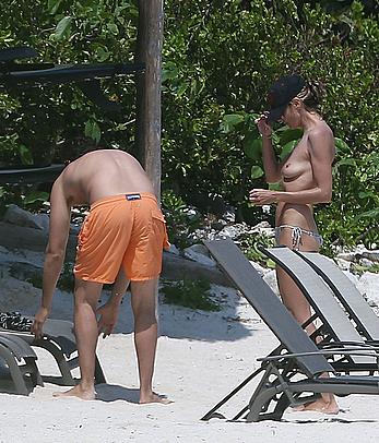 Heidi Klum caught topless on a beach in Mexico