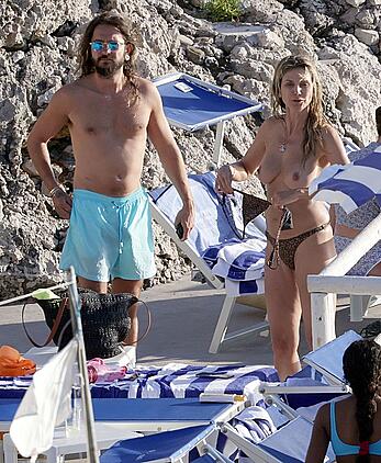 Heidi Klum topless on the beach in Capri