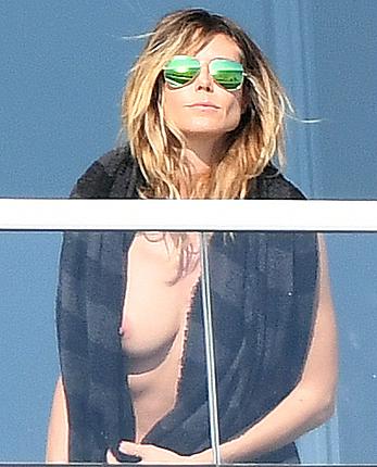 Heidi Klum topless on her hotel balcony in Miami