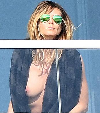 Heidi Klum topless on her hotel balcony in Miami