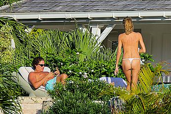 Heidi Klum topless in her hotel candids