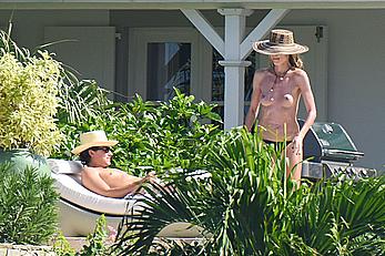 Heidi Klum topless in her hotel candids