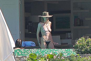 Heidi Klum topless in her hotel candids