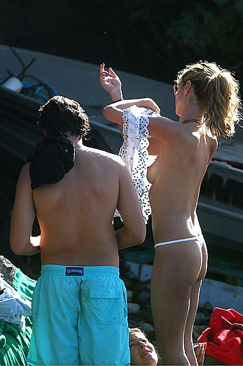 Heidi Klum topless in her hotel candids