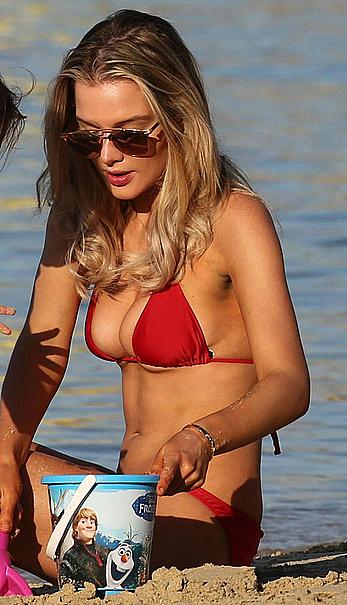 Helen Flanagan sexy in red bikini in a beach in Dubai